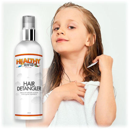 A girl combing her wet hair emphasising how easy and tangle free this formula is with a bottle of Healthy Rascals Hair Detangler in the foreground