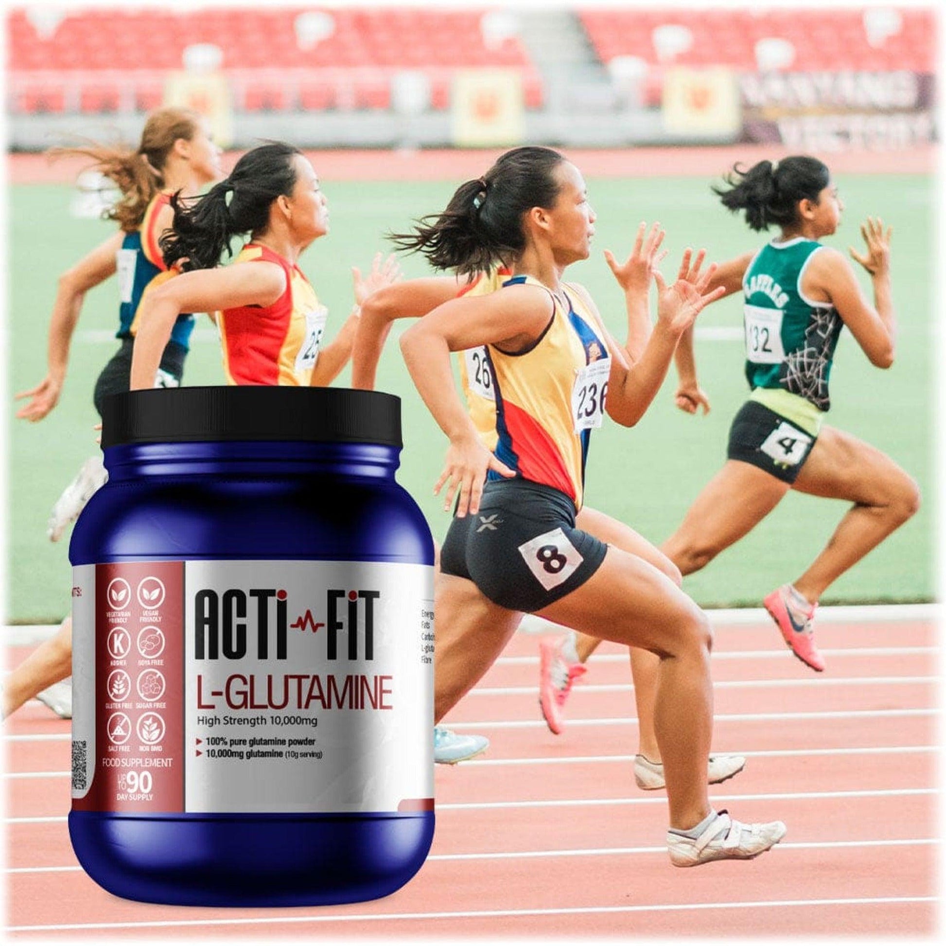 Women competing in a running race on an athletic track with a tub of Acti-Fit L-Glutamine 10,000mg in the foreground