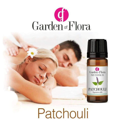 A couple having a massage with a bottle of Patchouli 10ml Essential Oil 