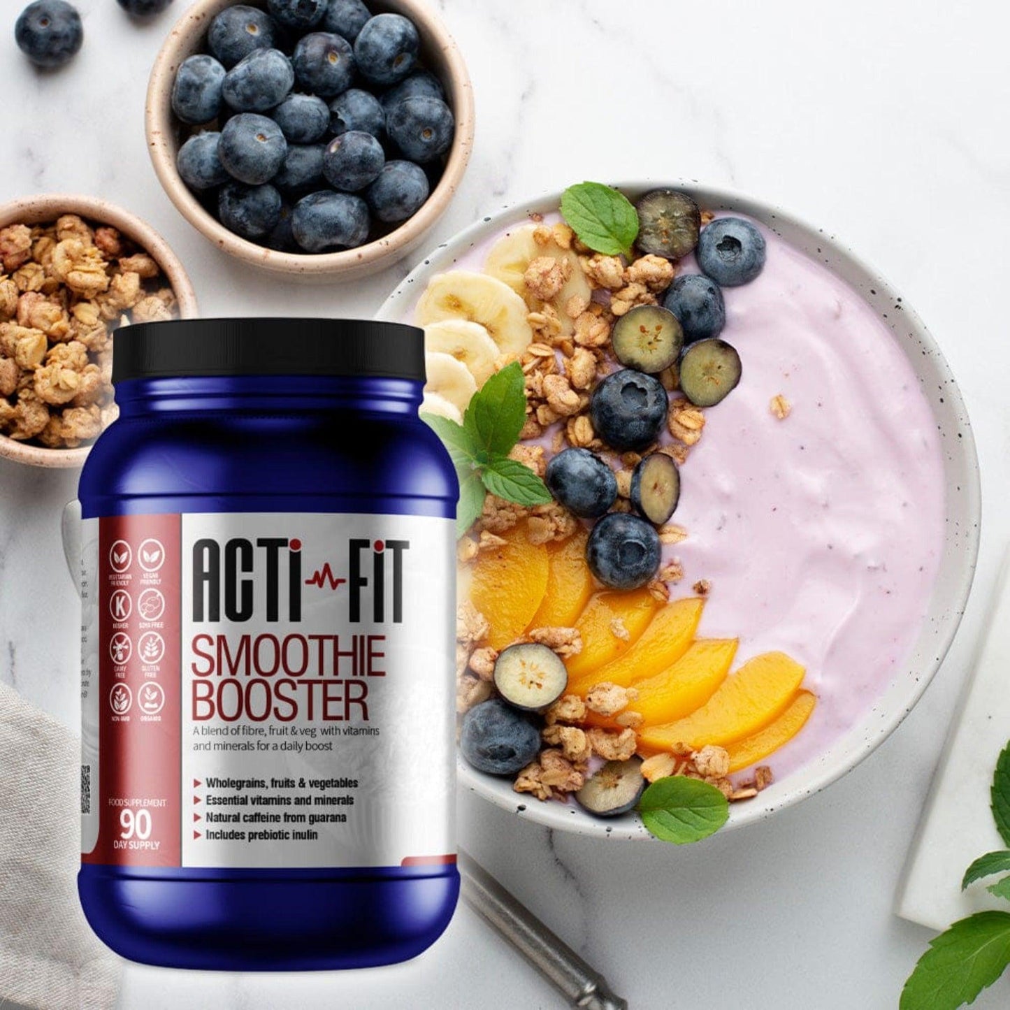 Blue container of Acti-Fit Smoothie Booster supplement, providing a blend of wholegrains, fruits, vegetables, vitamins, minerals, and prebiotic inulin, 30-day supply.